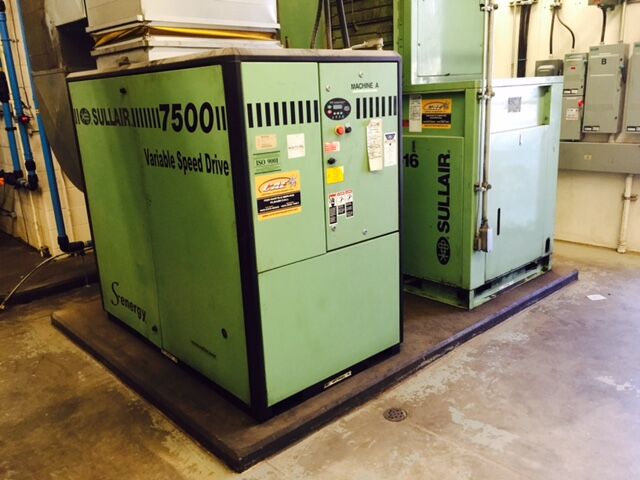 The serviced and adjusted 100-hp VSD air compressor, along with the retrofitted 75-hp air compressor — both from Sullair